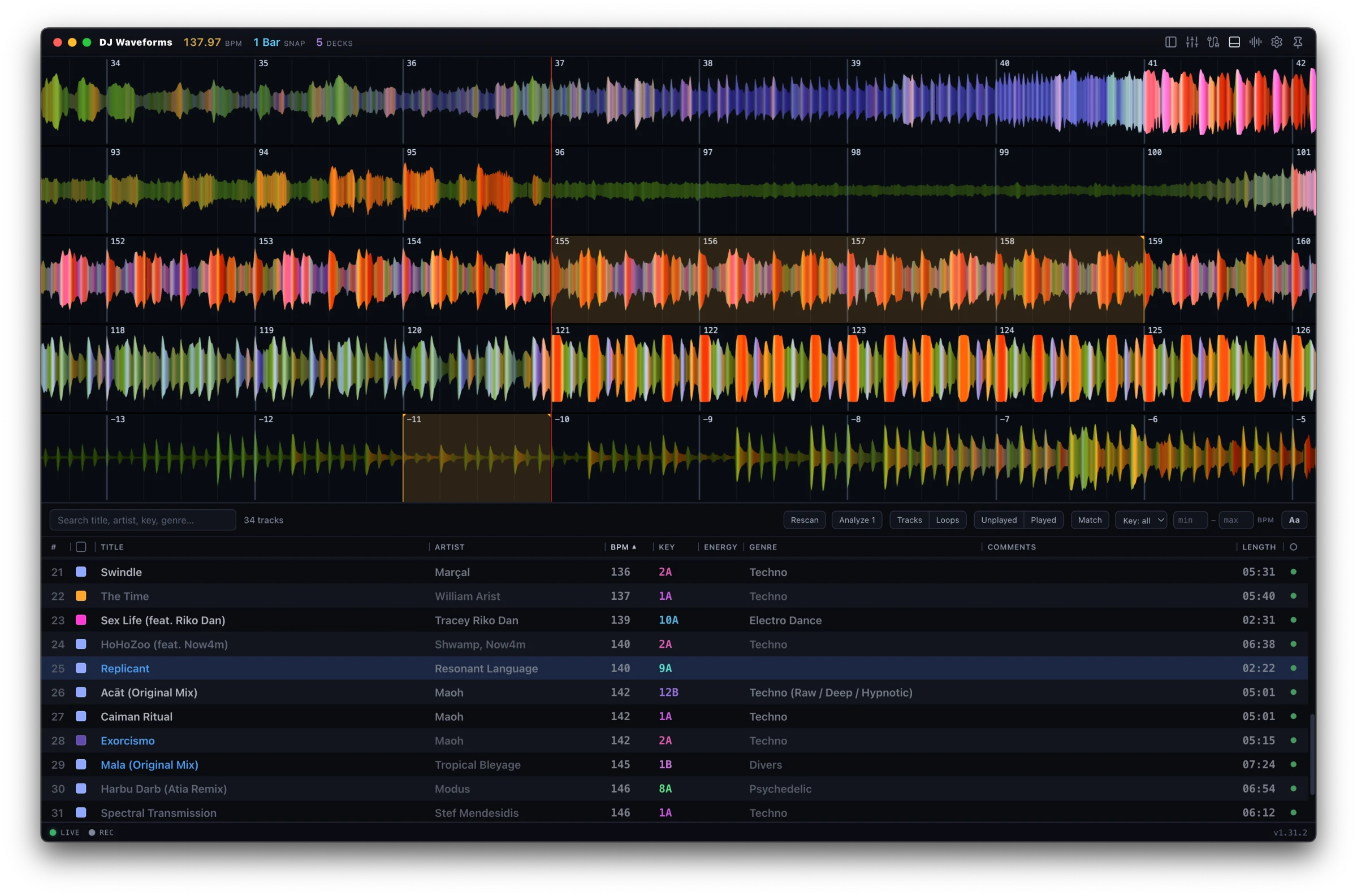 Five decks shown as full-width scrolling waveforms with the deck controls and mixer hidden, the library below